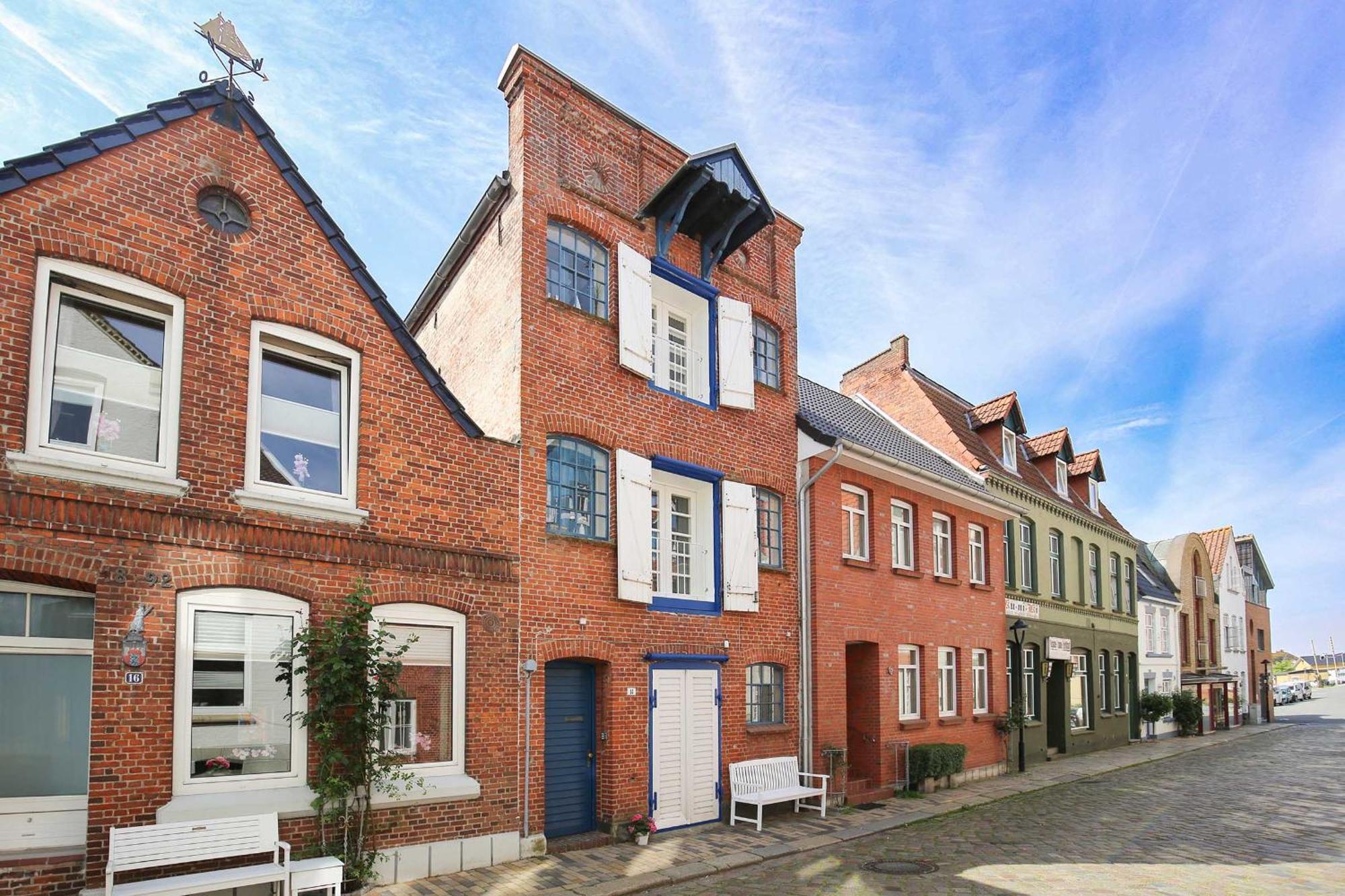 Altes Kontorhaus Kajuete Appartement Husum  Buitenkant foto
